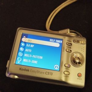 Kodack easy share camera silver 4 inches wide and 5 long